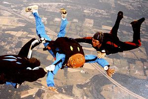 Theodore Wilson, in blue, during a previous jump.
